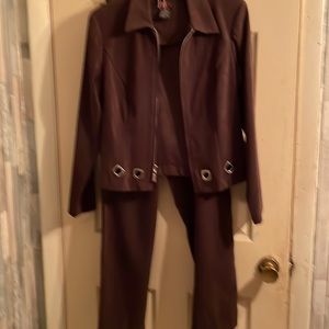 Brown pant suit made out of poly and spandex by R&K size 10p, slightly worn